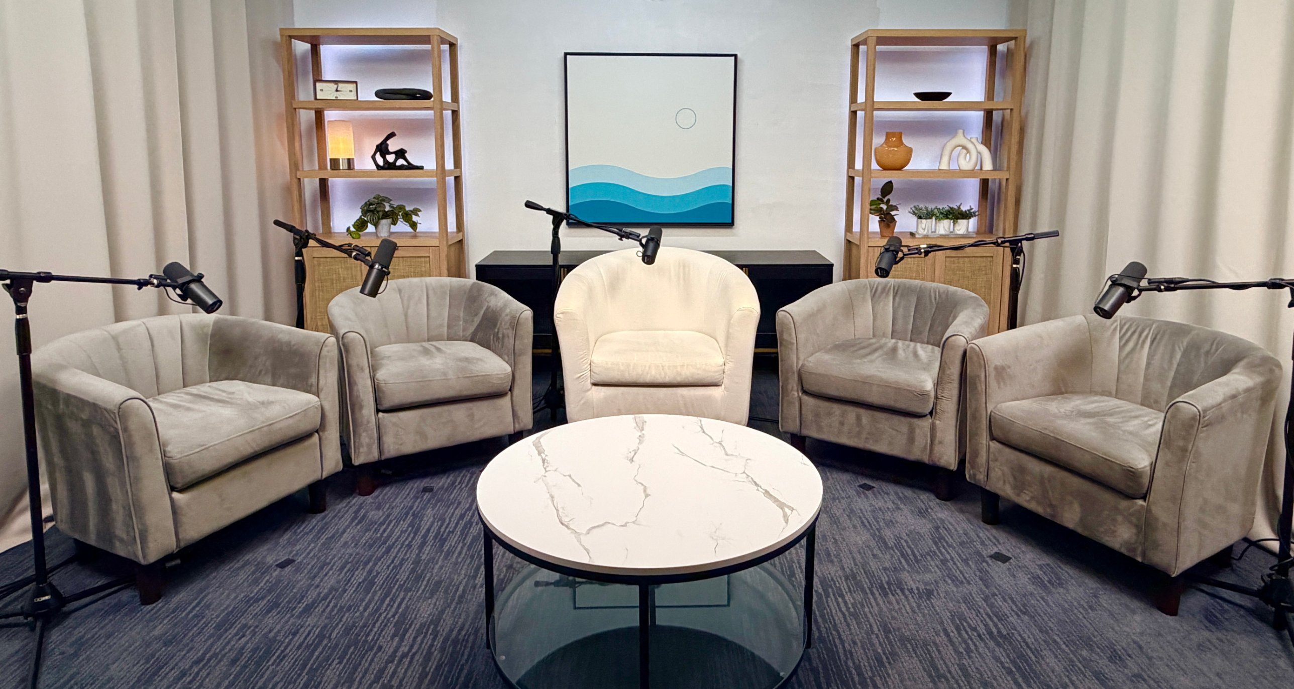 The EVRYBDY Studios podcast set: five chairs, five mics, ready to record