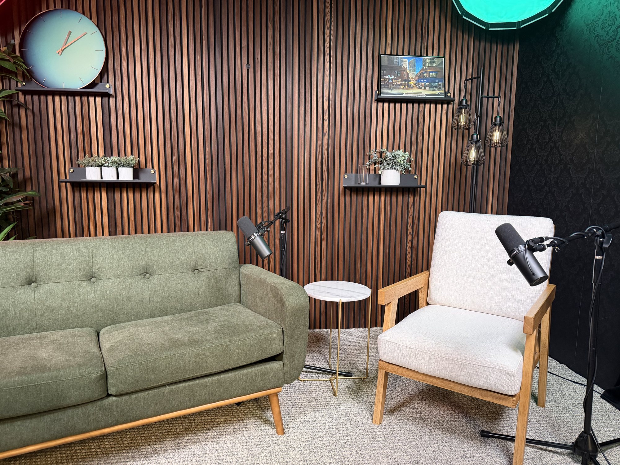 Set B, green couch on a wood slat wall